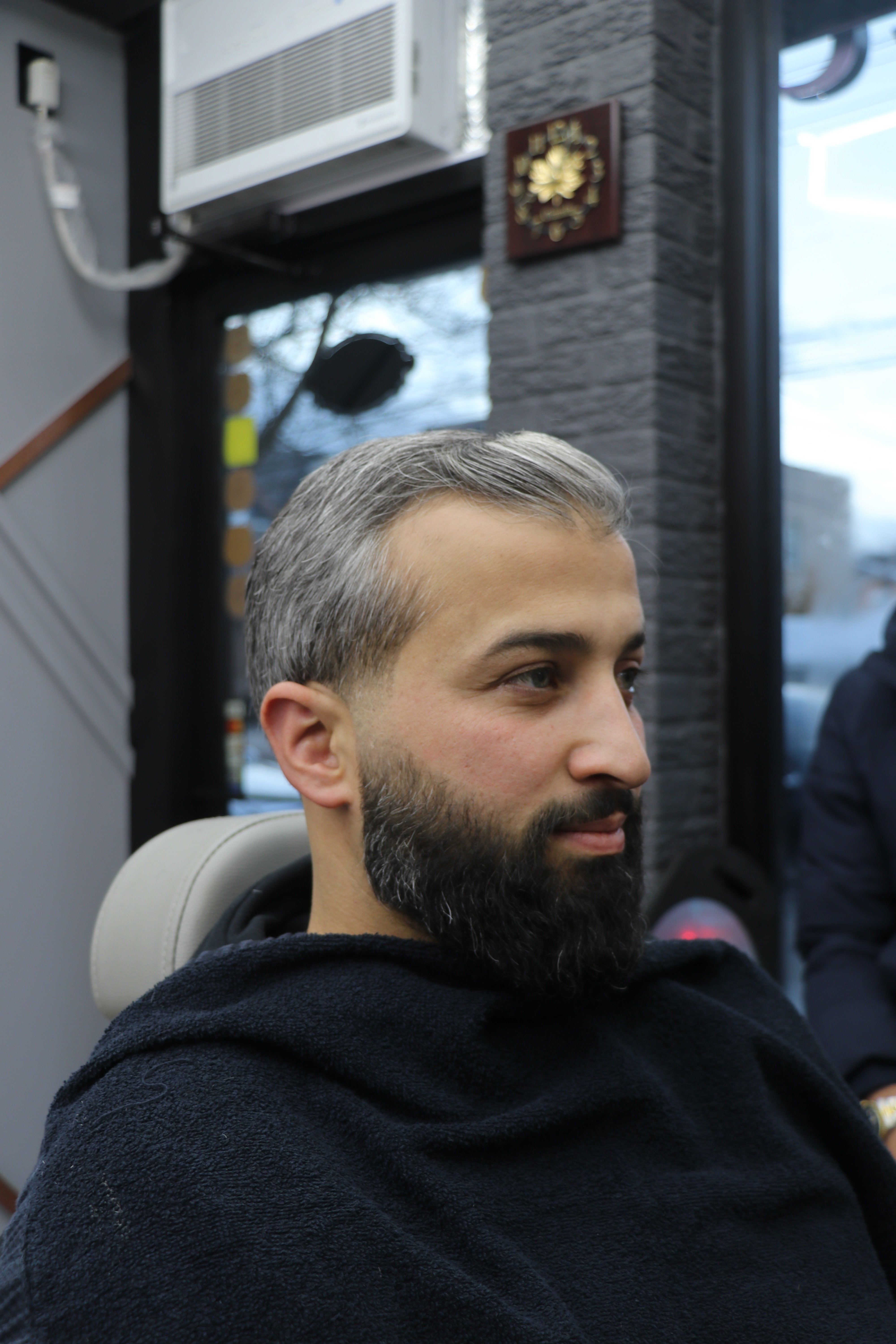 Crisp fade and a fully sculpted beard